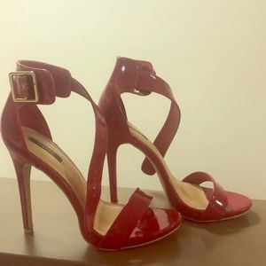 Red patent heels